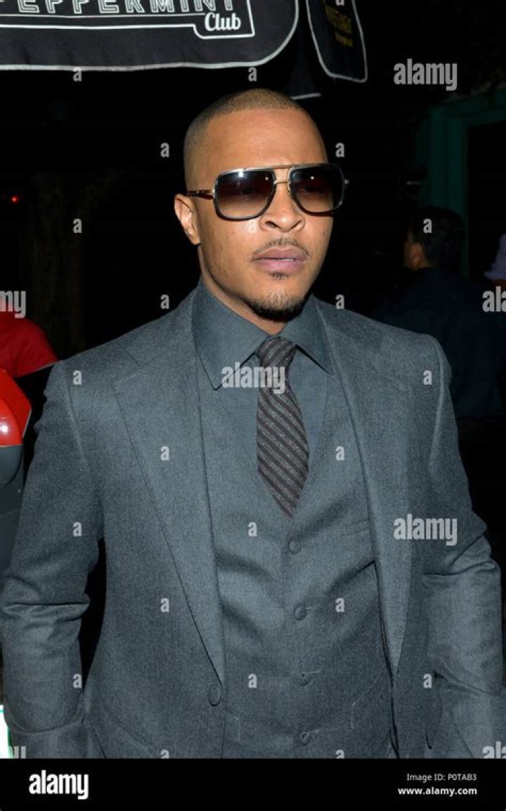 bitchy | Rapper T.I. Arriving At The Stevie Wonder Birthday Party At Peppermint Night Club.